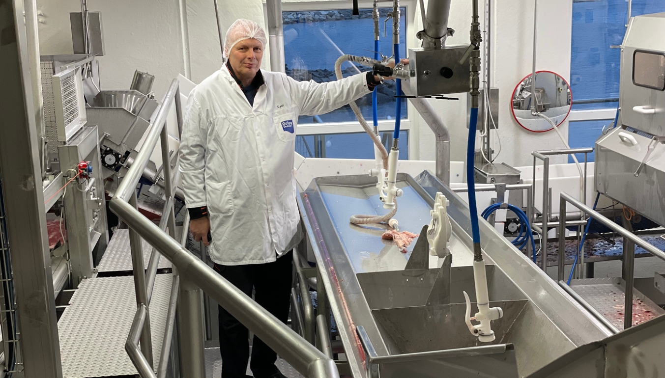 Kjell Bjerga, Technical Manager at Grieg Seafood Rogaland standing in front of a part of the Norbech salmon slaughtering solution..